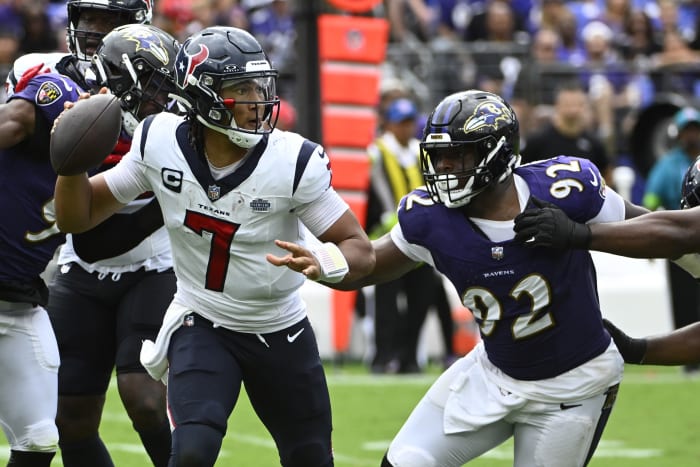 Sep 10, 2023; Baltimore, Maryland, USA; Houston Texans quarterback C.J. Stroud (7) attempts a pass as Baltimore Ravens defensive tackle Rayshad Nichols (91) rushes during the second half at M&T Bank Stadium.